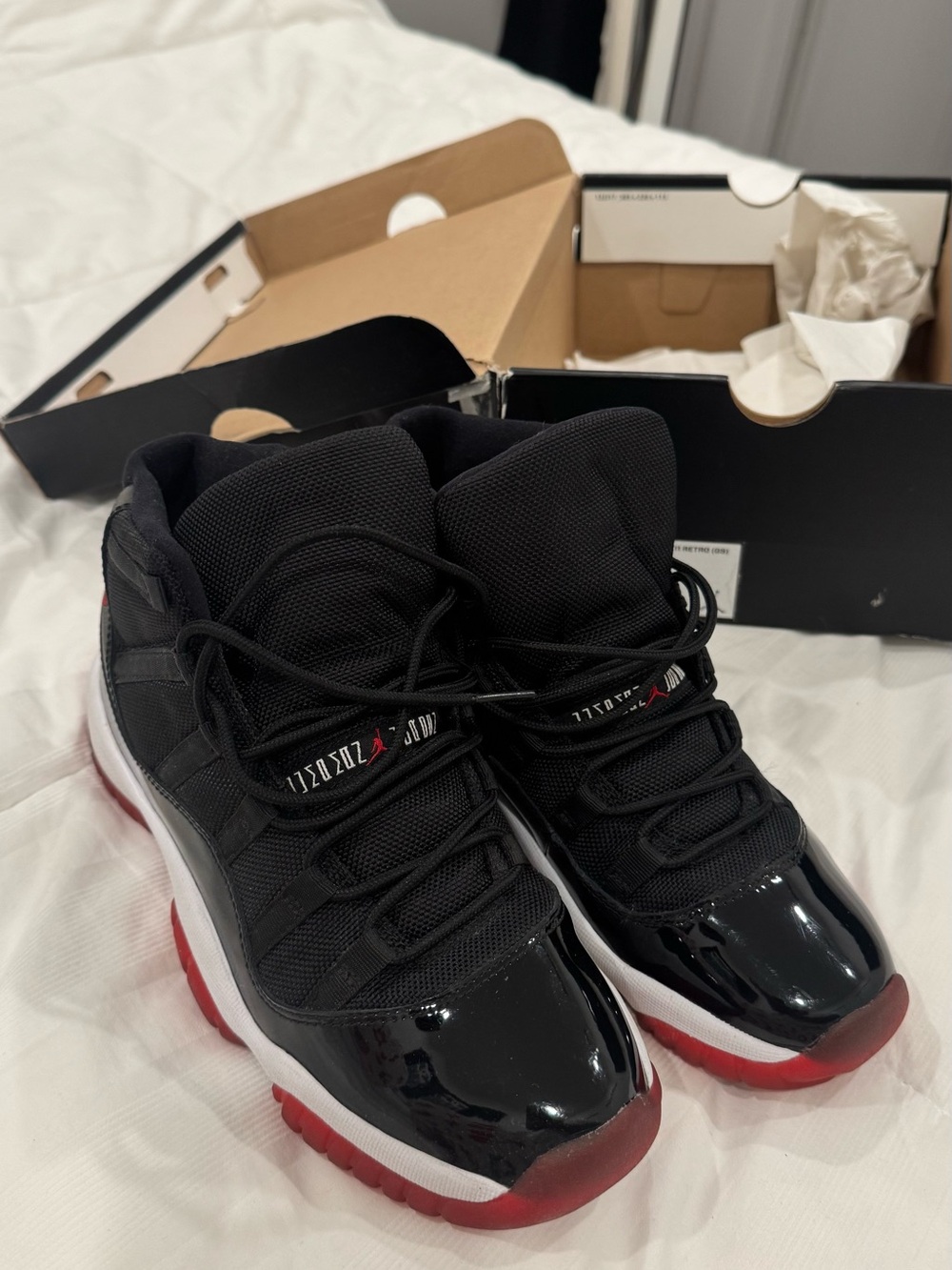 Air Jordan 11 Retro (GS) Black and Red High-Top Sneakers - Picture 2 of 7